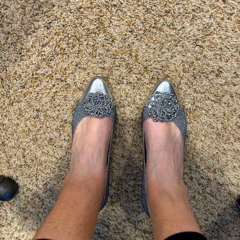 Women’s silver dressy shoe low heel.  Never worn  size 11